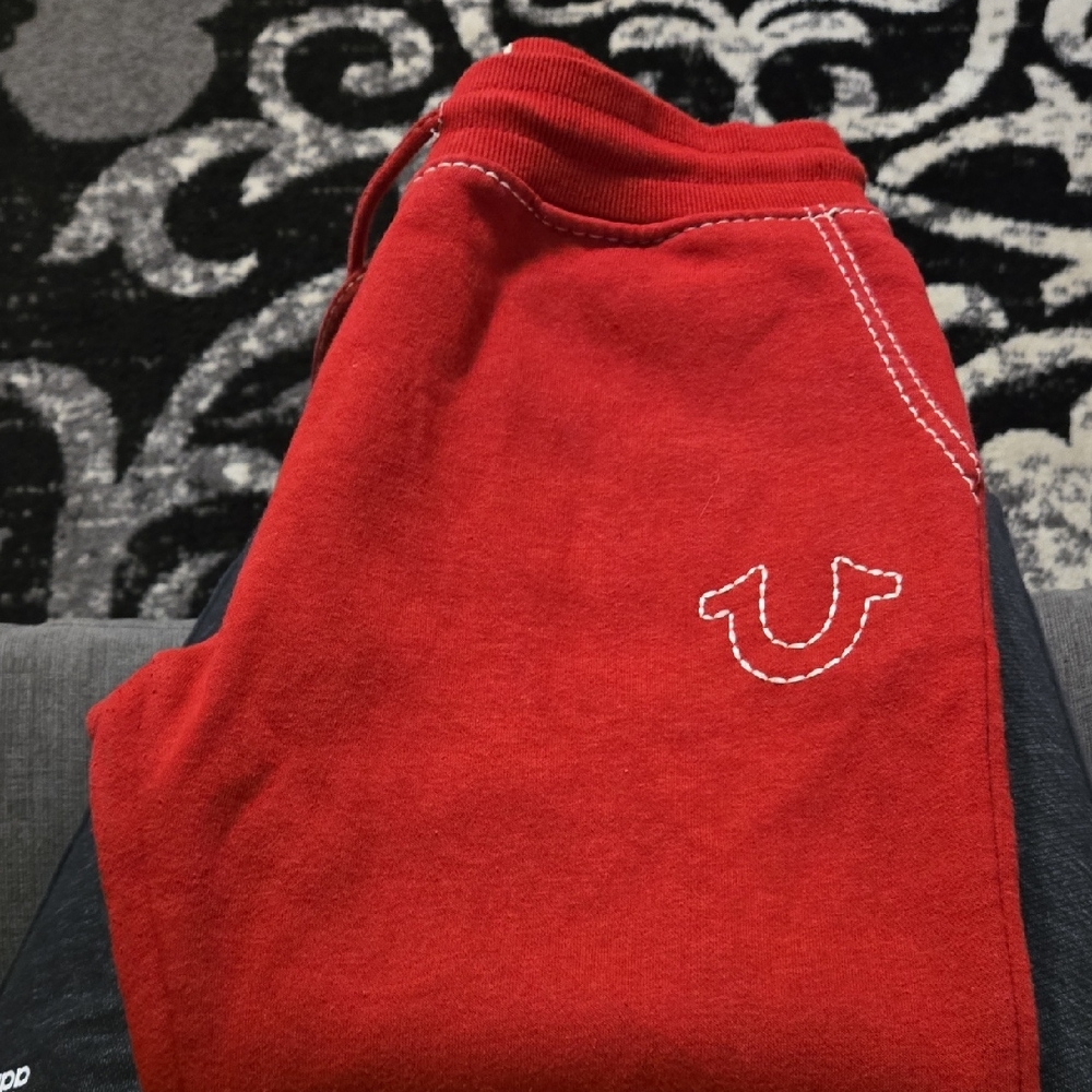 True Religion Red Joggers with white Details.